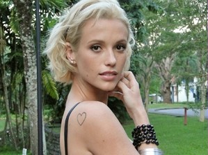Juliana Didone quer tatuar uma coruja.